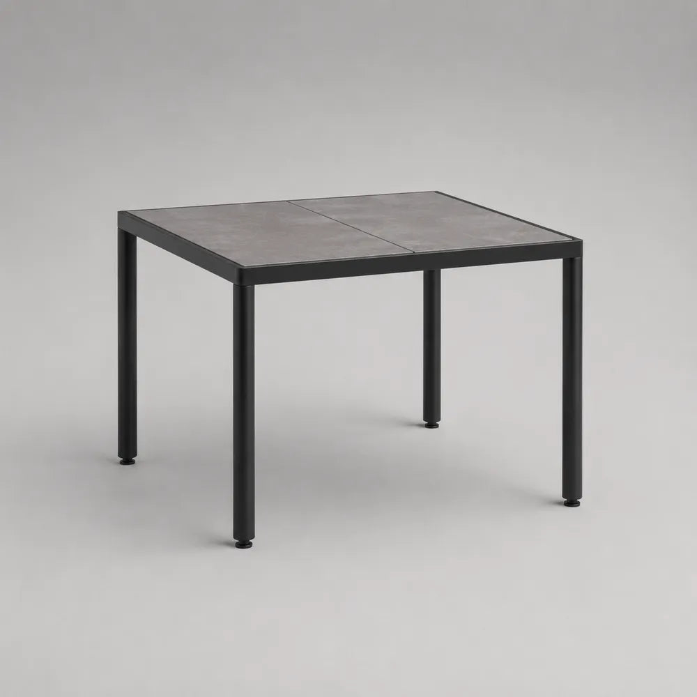 Table de jardin rectangulaire avec plateau effet pierre grise et structure en acier noir 140 x 80 x 75 cm
